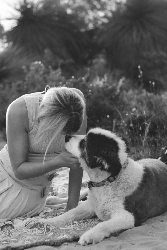 An image from a legacy session with The Lifestyle Phodographer, of Alex the dog and his loving family together in a Perth park. 